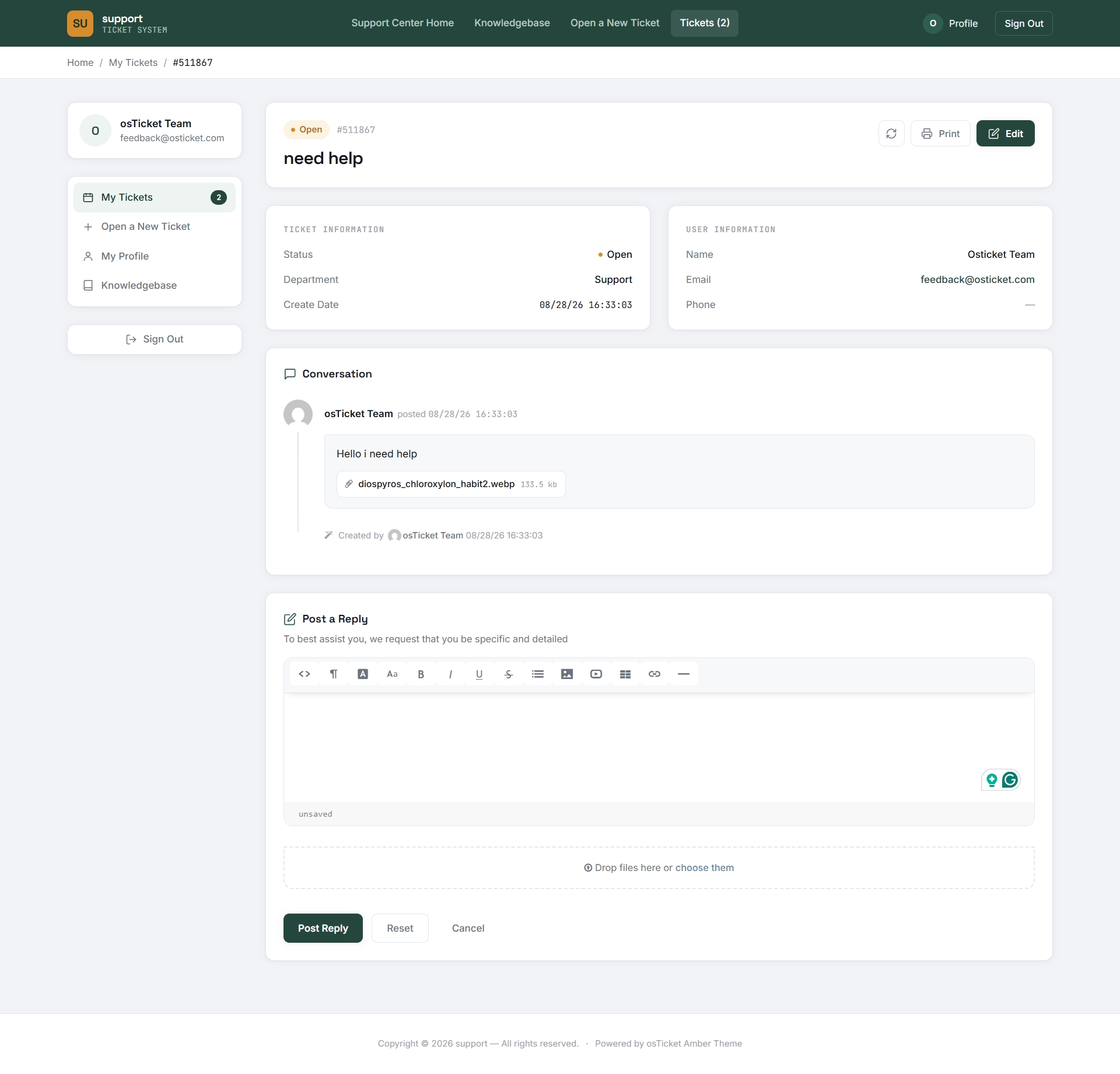osTicket Amber theme ticket detail view with conversation thread and reply editor